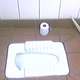 Illustration for article titled Azerbaijani Reporters Throw Toilet Paper, Antiquated Bathroom Device At Soccer Coach After Loss